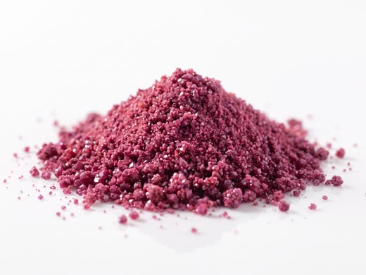 A small heap of deep pink chromium picolinate powder