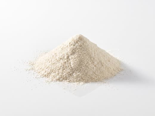 A small heap of pale cream digestive enzyme powder