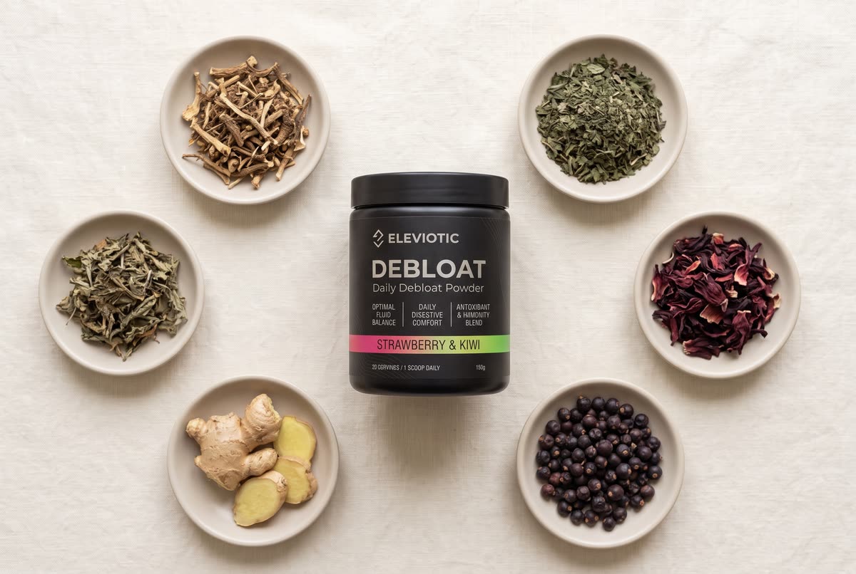 Dishes of dandelion root, nettle, hibiscus, ginger and juniper berries arranged around a tub of Debloat